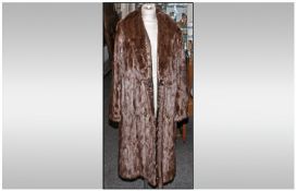 Ladies Brown Three Quarter Length Ermine Coat, fully lined. Hook & Loop fastening with inner tie.