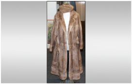 Full Length Blonde Mink Coat, fully lined. Label to inside reads `Continental Furs of Church St