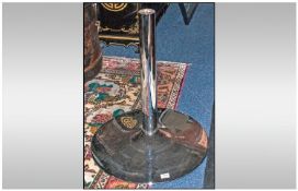 Contemporary Smoky Black Glass Topped Round Table on a chrome base. 4 feet in diameter.