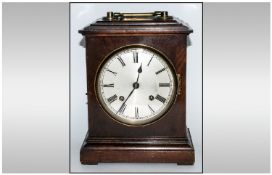 English - Late 19th Century Oak Cased Bracket Clock, with 8 Day Striking on a Gong. Silvered Dial,