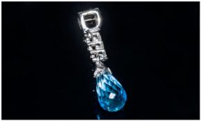 18ct White Gold Diamond Pendant Set With 3 Round Cut Brilliant Diamonds Above A Blue Faceted Gem