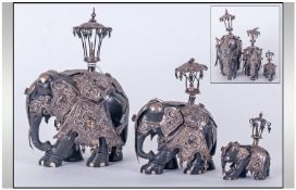 A Set Of Three Antique Indian Graduated Silver Elephants, studied with semi precious stones, the