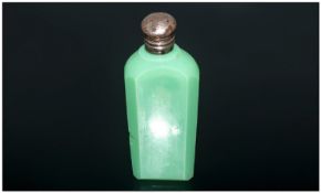 A French Green Opaline Faceted Scent Bottle with a silvered metal top with an inner glass