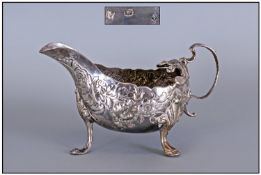 Irish George II Fine Quality Silver Sauce Boat, embossed with trailing foliage and flowers,