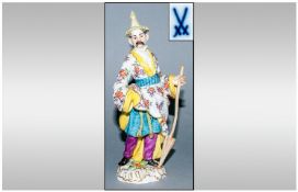 Meissen Chinoiserie Figure of a Man with a long handled parasol and impressive, decorated hat, his