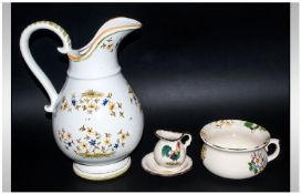 French Porcelain Water Jug, 14 inches in hiehgt. Together with a potty and trinket dish. Yellow and