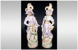 French Pair of Fine Late Nineteenth Century Hand Painted Bisque Figures of a lady and gentleman in