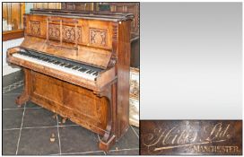 Carved Walnut Late Victorian Piano with three carved panels to the top. Makers name Hibbs Ltd.