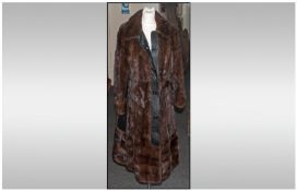 Full Length Luxury Mink Coat. Leather inserts. Fully lined. Excellent condition. Approx size