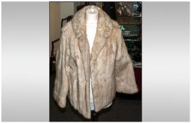 Ladies White Musquash Three Quarter Length Coat, fully lined. Collar with revers. Label Inside