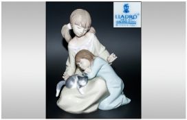 Lladro Figure ` Little Sister ` Model No.1534. Issued 1988, Height 7 Inches. Excellent Condition.