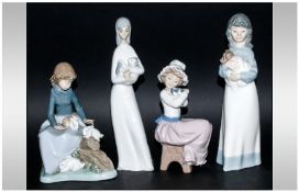 Nao by Lladro Figures ( 4 ) In Total, Children with Animals, Various Sizes. Sizes 9.25 x 2, 6.5 &