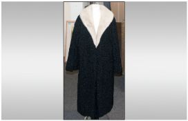 Beaver Lamb Coat with Mink Collar fully lined with hook and eye fastening. Label to inside reads `