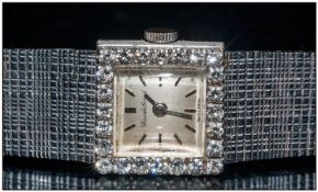 Bueche Girod 18ct Diamond Set Ladies Watch the watch has an 18ct white gold case & bracelet, the