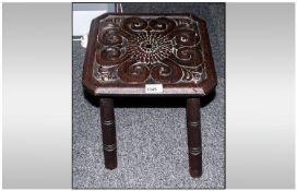 A Folk Art Carved Top Oak 4 Legged Stool 14`` in height.