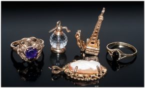 Collection Of 9ct Gold Jewellery Comprising Novelty Blackpool Tower Charm, Soda Flask Charm, Shell