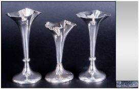 Set Of 3 hallmarked sterling silver bud vases.  Classical shape, but fluted and pinched with