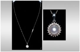 9ct White Gold Diamond And Pearl Pendant