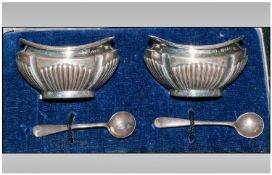 Boxed Silver Condiment Set consisting two matching silver boat shaped containers and two silver