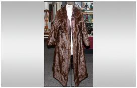 Ladies Three Quarter Length Squirrel Dark Brown Coat. Fully lined. Collar with revers. Hook & Loop