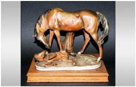 Capo-Di-Monte Signed Horse & Foal Figure Group raised on a wooden plinth. Signed Giuseppe Armani,