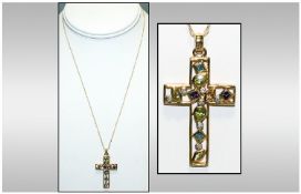 A Vintage 9ct Gold Diamond and Mutli Stoned Set Cross, Fitted to a 9ct Gold Chase Chain. The Stones