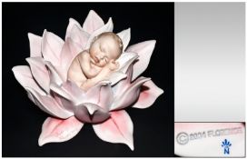 Contemporary Modern Italian Figure by Guiseppe Armani. `Water Lily Baby` signed to base. 7`` in
