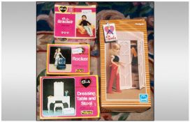 A Collection Of Five Sindy Toys To Include Sindy Wardrobe, Sindy Yellow Armchair, Sindy Washdry,