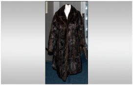 Ladies Three Quarter Length Dark Brown Musquash Coat, fully lined. Collar with revers, Cuff