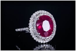 14ct Gold Set Ruby & Diamond Ring the central ruby of good quality & clarity. Surrounded by over 60