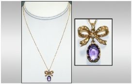 A Victorian 9ct Gold Set Seed Pearl and Amethyst Bow Tie / Ribbon Pendant, Fitted to a 9ct Gold