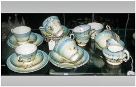 Decorative Part Teaset comprising teacups, saucers and sideplates. Hand Painted Oriental style