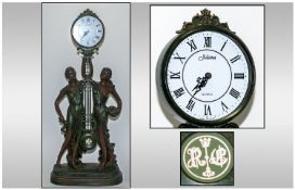 Juliana Large Figural Bronze Effect Quartz Swinging Mystery Clock, Circa 1993. In the form of two