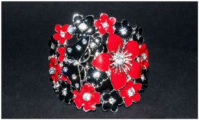 Red and Black Enamel Cuff Bangle, flowers and a butterfly enamelled in either black or red and