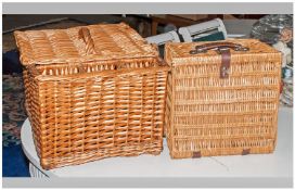 Two Whicker Picnic Baskets, one complete with teaset and fittings.