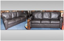 Leather Two Piece Suite comprising two dark brown three seater settees. As new condition. 85`` in