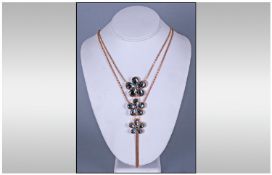 Butler and Wilson Style Floral Pendant Necklace, the pendant comprising three graduated, five petal