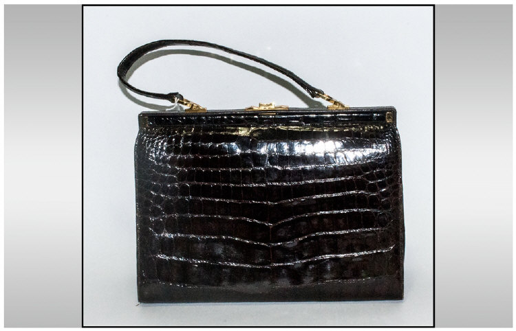 Dark Brown Crocodile Frame Handbag, patent finish with gold tone click clasp and fittings, lined in