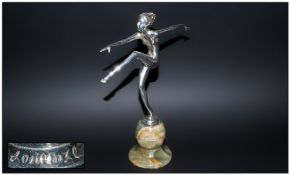 Lorenzel Signed Art Deco Silvered Figure Of A Naked Woman In A Dancing Position. raised on a shaped