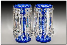 Pair of Bohemian Glass Lustres, the glass of the stands overlaid with Bristol blue coloured glass,