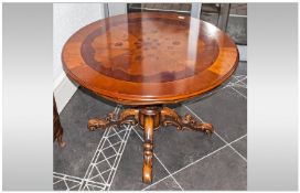 Wooden Carved Coffee Table with circular top and carved base. Standing on four splayed legs. 39