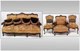 19th/20th Century Mahogany Framed Bergere Suite, three seater sofa heavily carved mahogany frame