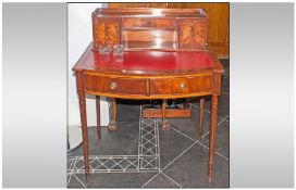 Ladies Mahogany Writing Bureau, with red leather top, curved front and two drawers. Raised on four