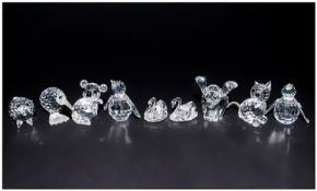 Swarovski Miniature Cut Crystal Figures 8 in total comprising, elephant, ant eater, cat, pig, baby