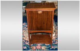 Inlaid Mahogany Fall Down Front Cabinet with square tapering legs on platform base