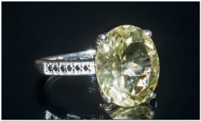 Green Gold Quartz Solitaire Ring, an oval cut stone of 4cts of this rare, sparkling colour of