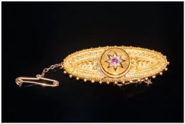 Victorian 15ct Gold Ruby & Diamond Brooch/Pendant with safety chain. Marked 6.25. 1.75`` in width.