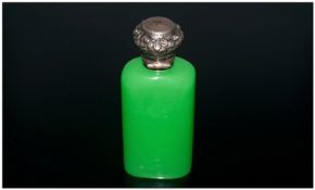 A French Jade Green Opaline Scent Bottle of Large Size, with a rounded body, with a silvered metal