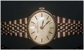 Eterna-Matic Ladies 9ct Gold Wristwatch with intergal 9ct gold bracelet. Signed movement and hourly