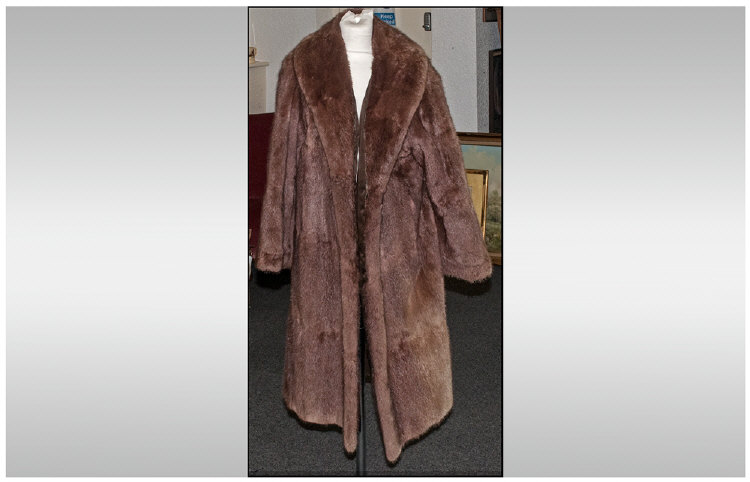 Full Length Luxury Mink Coat. Leather inserts. Fully lined. Excellent condition. Approx size 12.